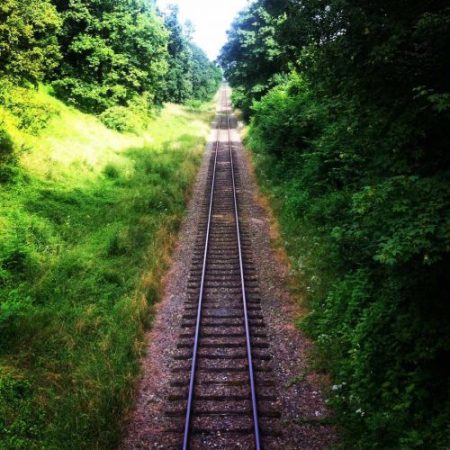Railroad track into the horizon
