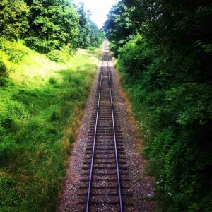 Railroad track into the horizon